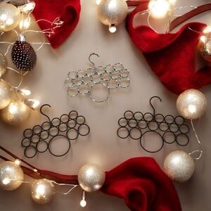 Set of 3 accessory, scarf or belt holders.